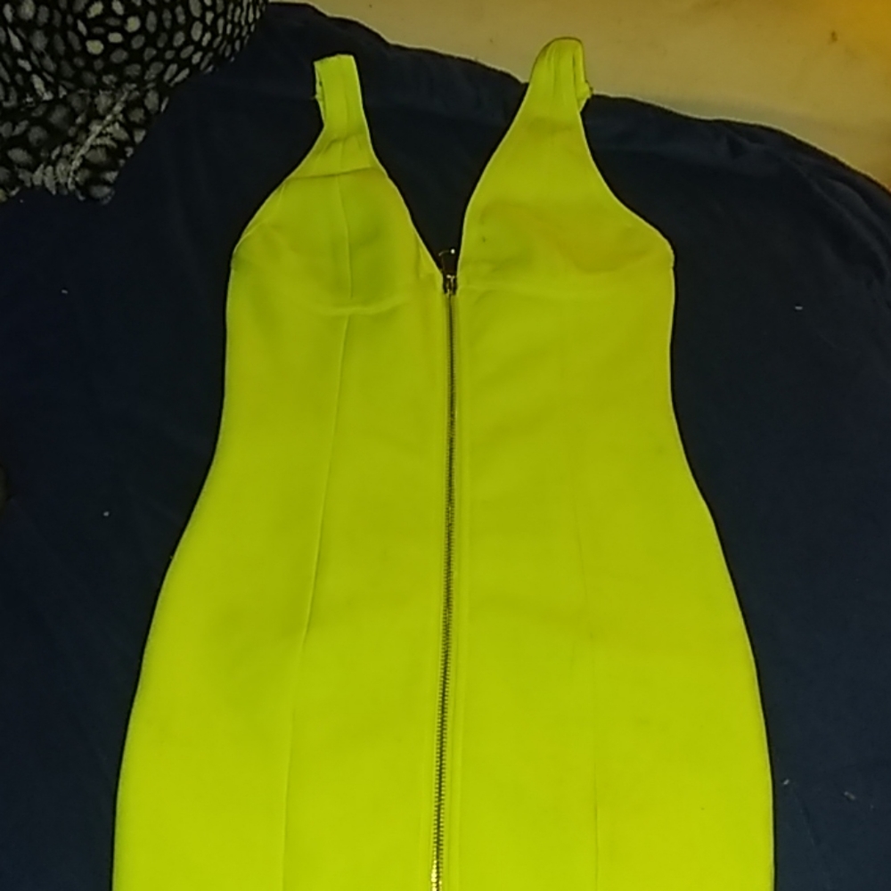 A neon green dress/ short